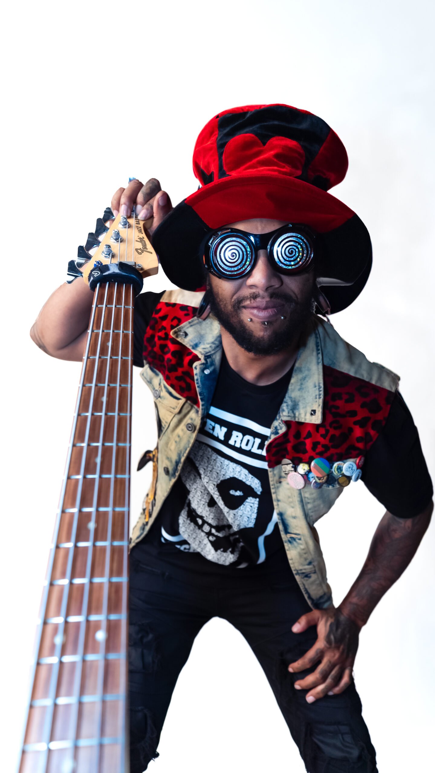 HashBass Hashim Bunch, also known as Hash or Dr. Bass, is the bassist for R.E.A.L. Born into a musical family, he was surrounded by rhythm and melody from an early age. His mother introduced him to music, and he started playing percussion in their African band before developing a strong interest in guitar.