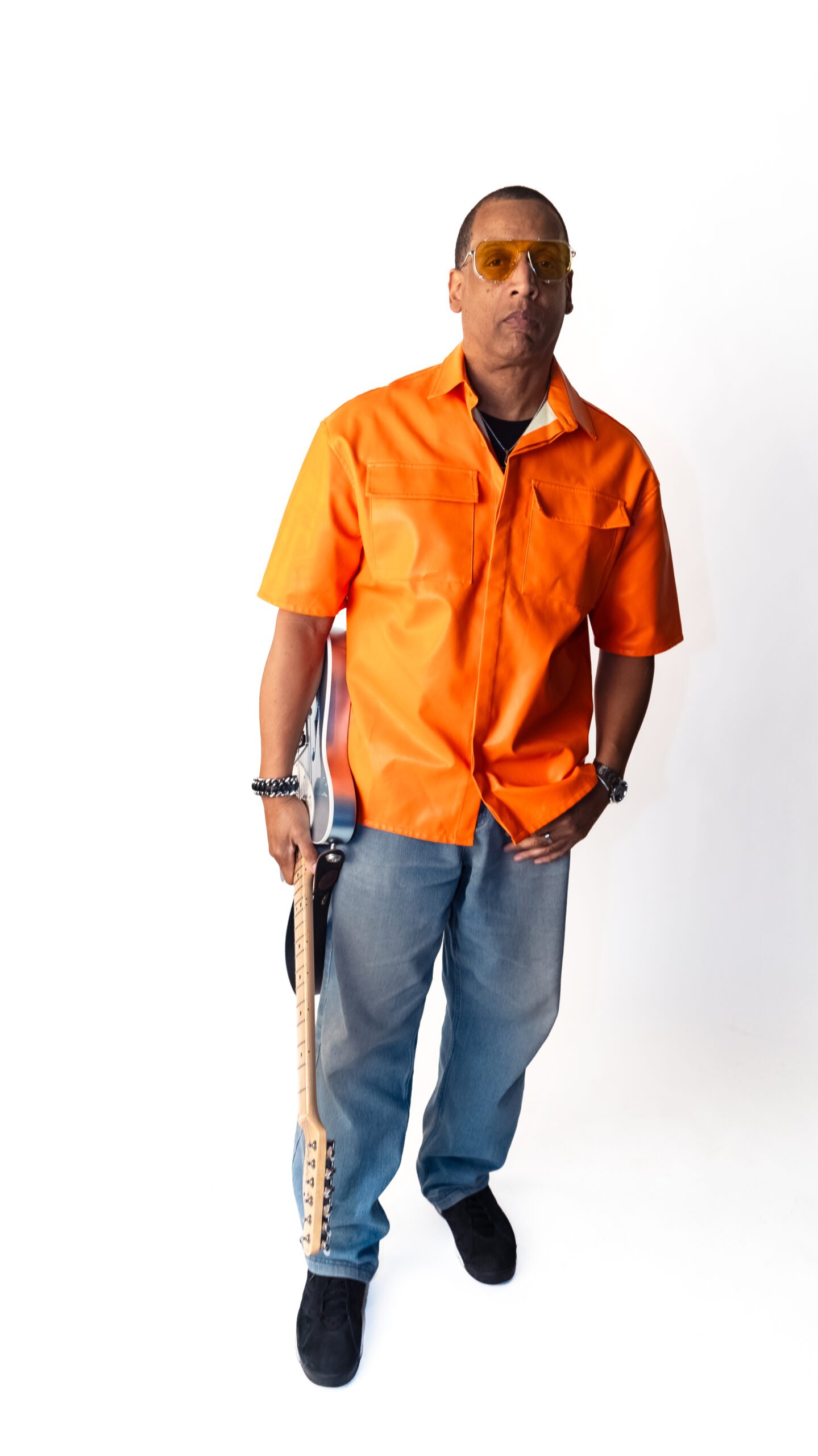 TonyGuitar 1 Tony, short for Tony Bunch, is the guitarist, writer, and composer for R.E.A.L., bringing decades of experience and passion to the group. His love for music began at the age of 10 when he picked up a guitar for the first time, instantly falling in love with the instrument. By the time he was 12 or 13, he was deeply inspired after seeing Earth, Wind & Fire live, solidifying his desire to pursue music.